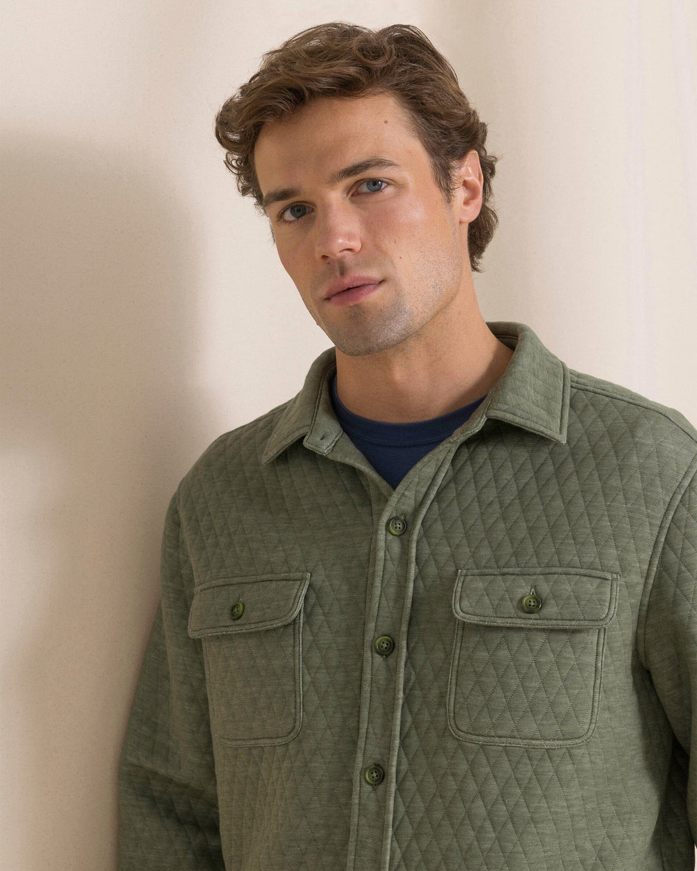 The detail view of the Southern Tide Heather Quilted Knit Shacket by Southern Tide - Heather Cedar Green