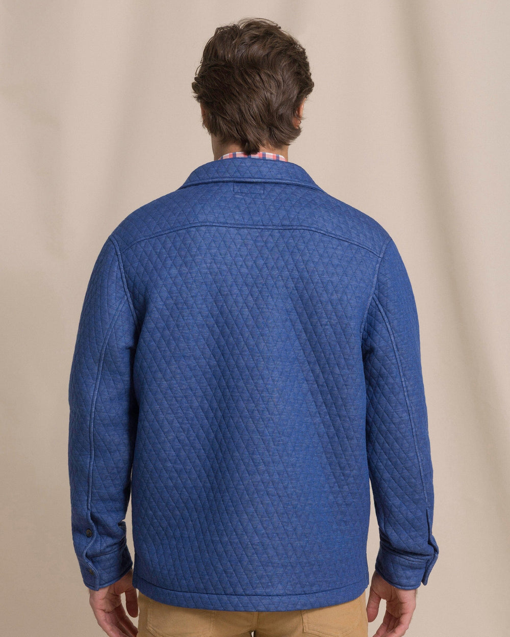 The back view of the Southern Tide Heather Quilted Knit Shacket by Southern Tide - Heather Nautical Blue