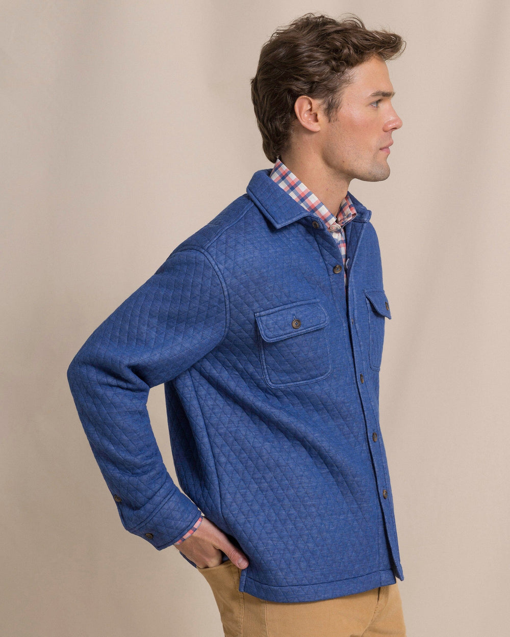 The side view of the Southern Tide Heather Quilted Knit Shacket by Southern Tide - Heather Nautical Blue