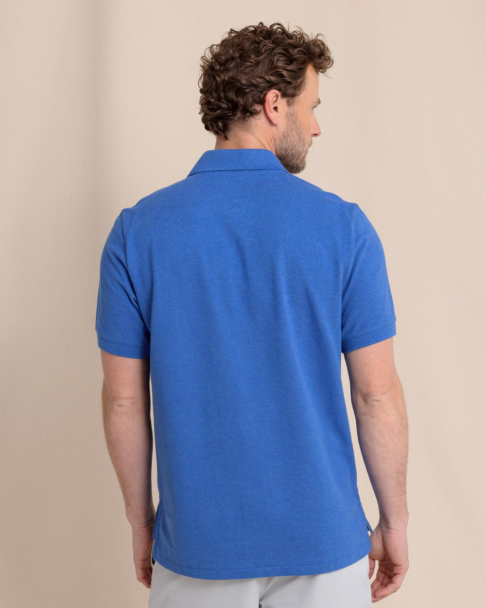 The back view of the Southern Tide Heather Skipjack Polo by Southern Tide - Heather Blue Lolite