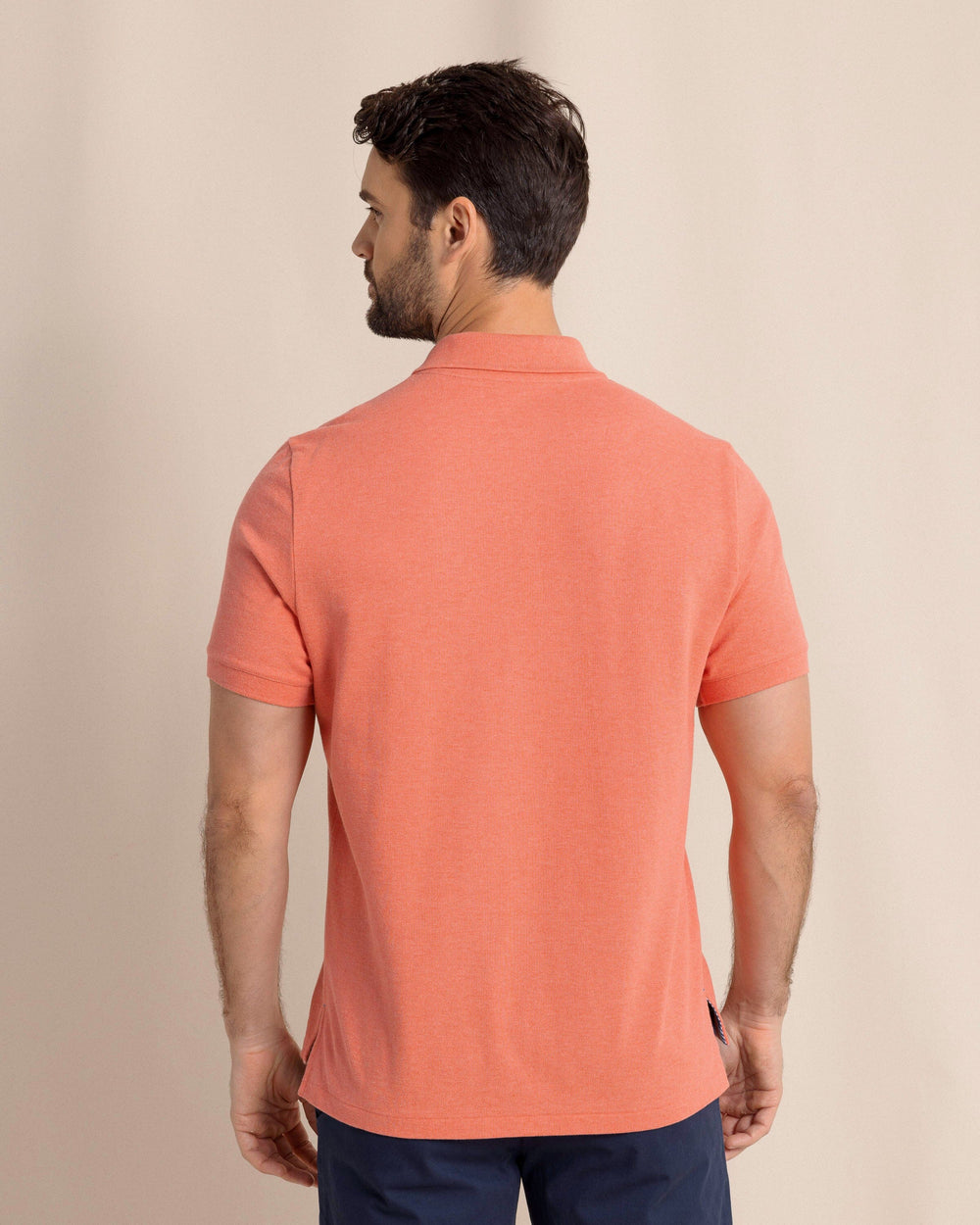 The back view of the Southern Tide Heather Skipjack Polo by Southern Tide - Heather Melon