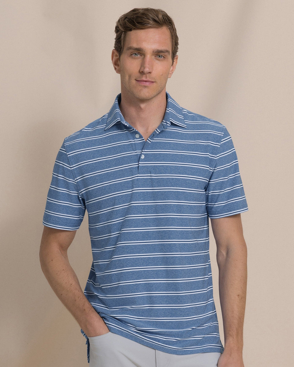 The front view of the Southern Tide Heather Stripe Coastal Breeze® Performance Polo by Southern Tide - Heather Nautical Blue