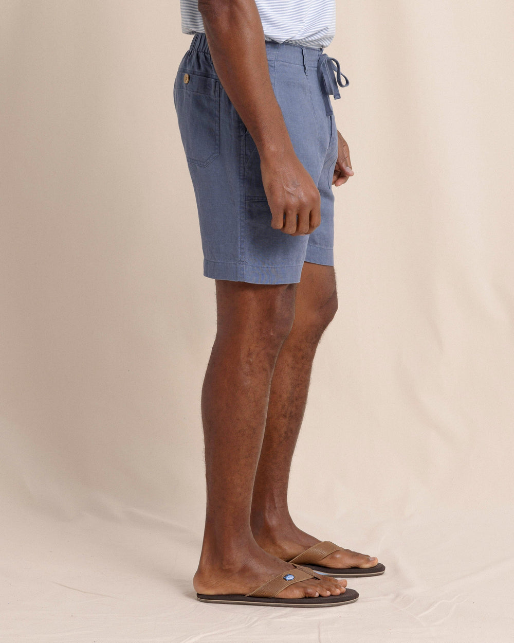 The side view of the Southern Tide Heritage Preserve Linen Short by Southern Tide - Light Indigo