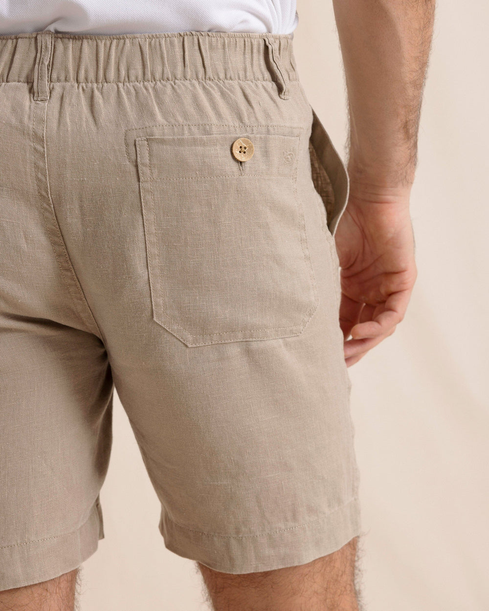 The back detail view of the Southern Tide Heritage Preserve Linen Short by Southern Tide - Sandstone Khaki