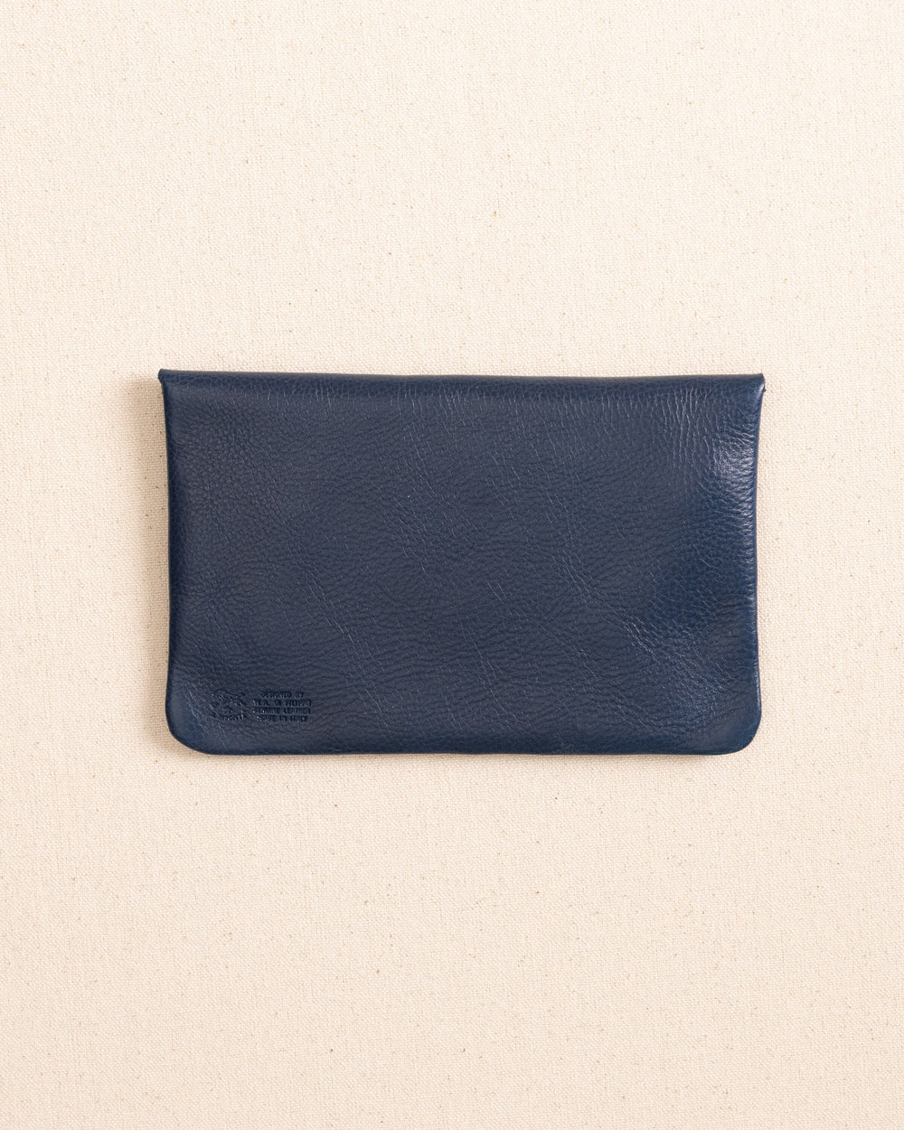The back view of the Il Bisonte Leather Envelope Pouch at Southern Tide - Blue