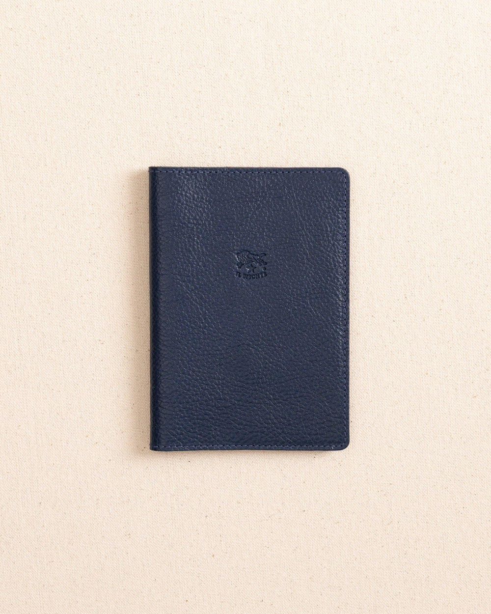 The front view of the Il Bisonte Passport Case at Southern Tide - Blue