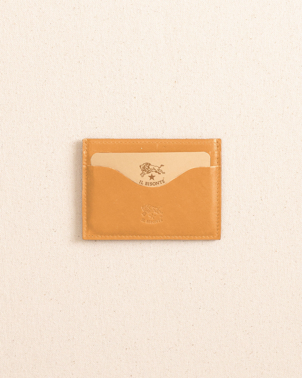 The front view of the Il Bisonte Salina Card Case at Southern Tide - Natural