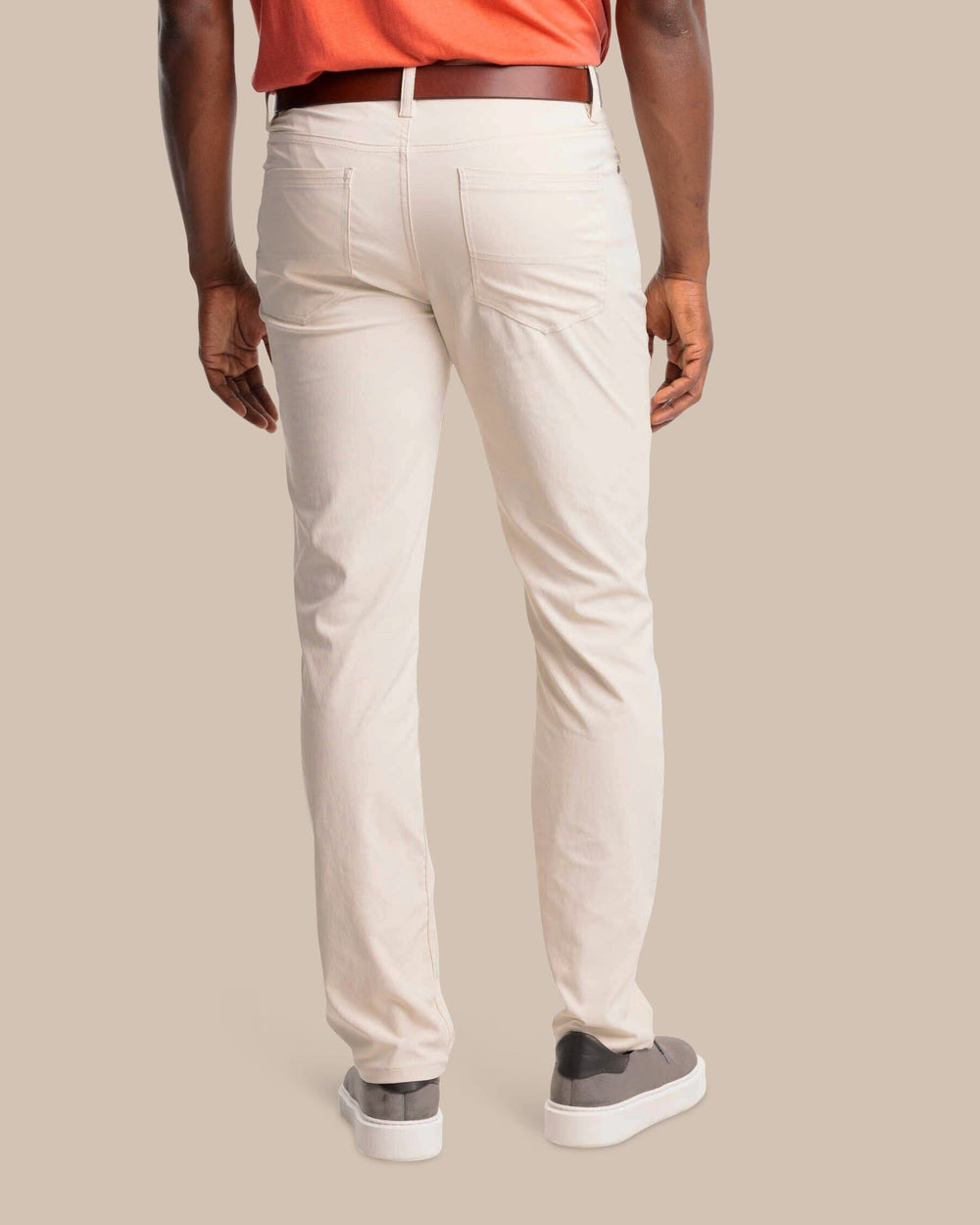The back view of the Southern Tide Intercoastal Performance Pant by Southern Tide - Stone