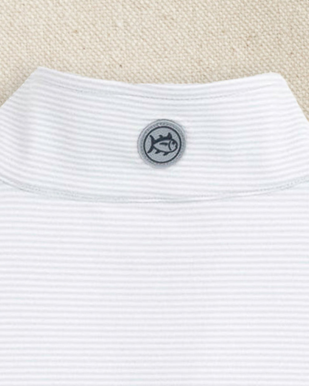 The detail view of the Southern Tide Iowa Hawkeyes Cruiser Micro-Stripe Quarter Zip by Southern Tide - Heather Slate Grey