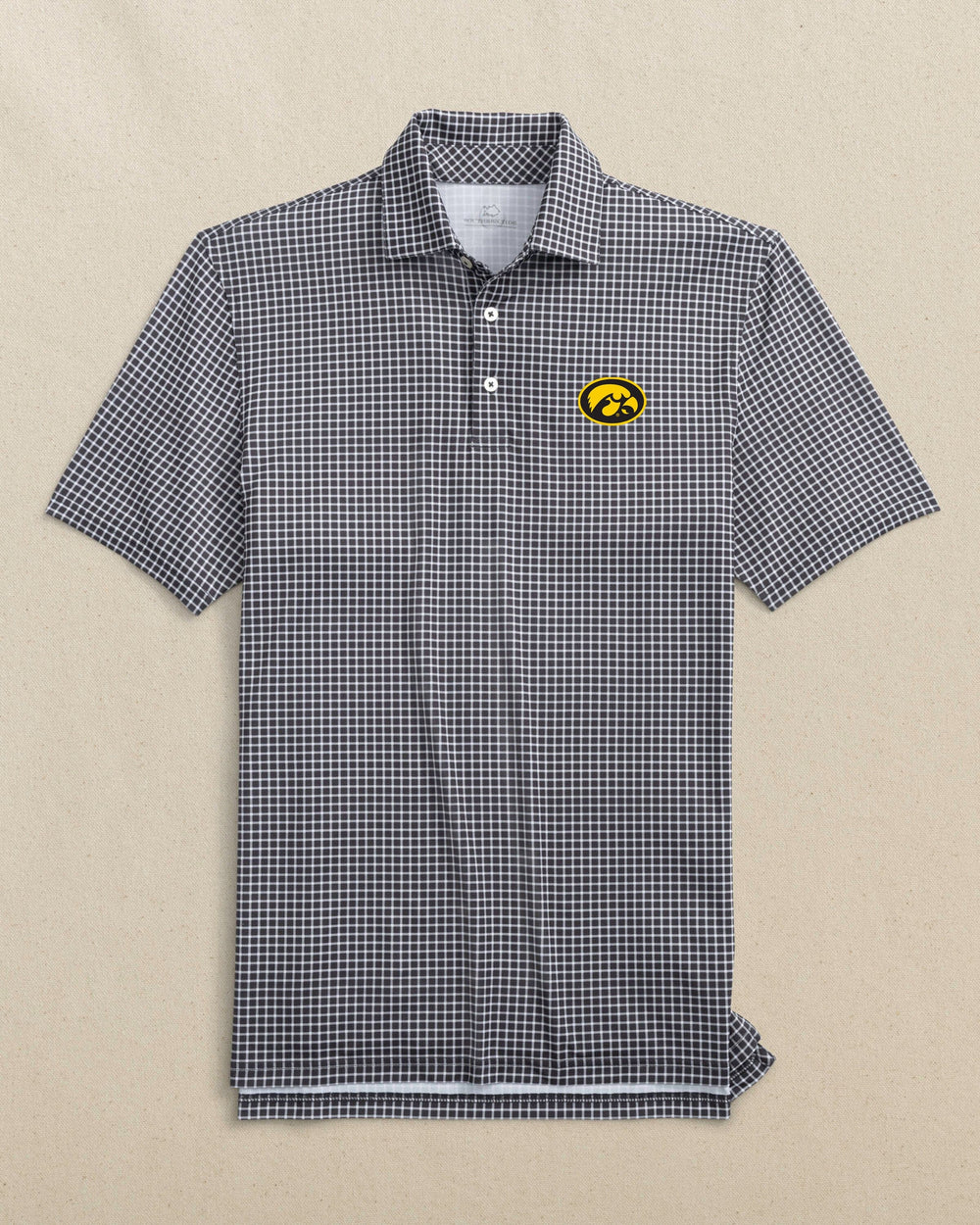 The front view of the Southern Tide Iowa Hawkeyes Driver Dunes Edge Plaid Polo by Southern Tide - Black