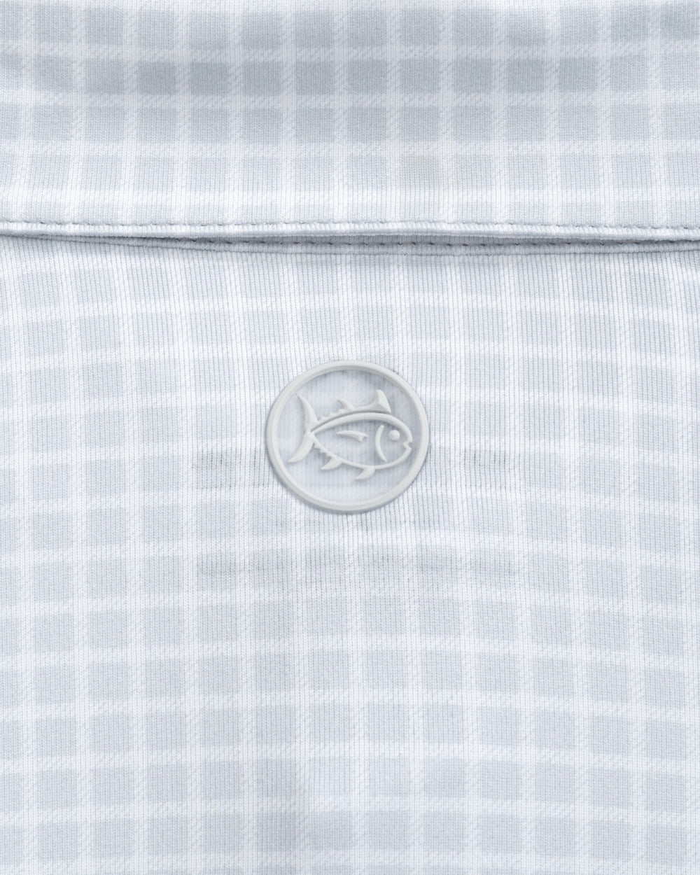 The detail view of the Southern Tide Iowa Hawkeyes Driver Dunes Edge Plaid Polo by Southern Tide - Slate Grey