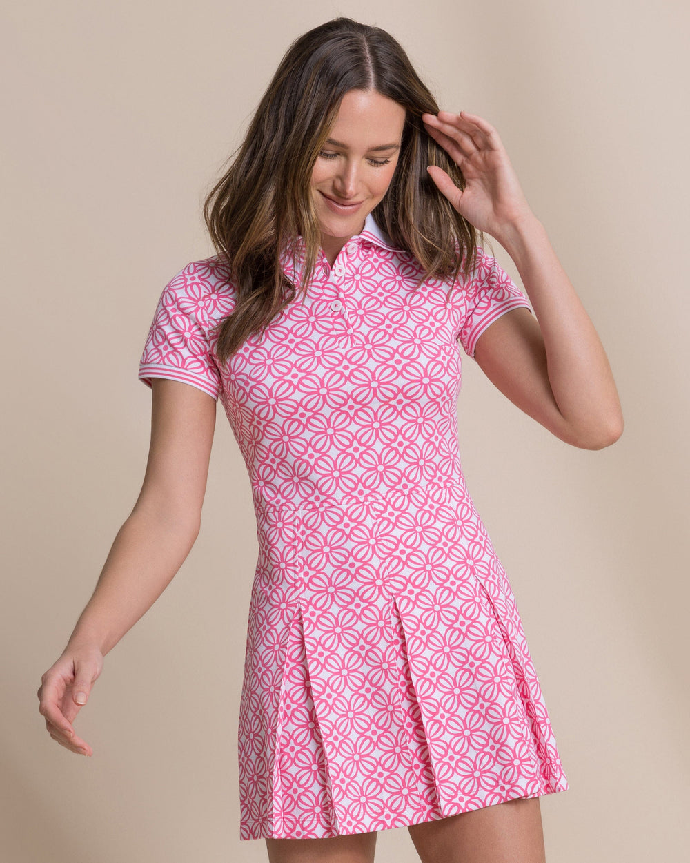The front view of the Southern Tide Isabelle Printed Polo Active Dress by Southern Tide - Island Pink