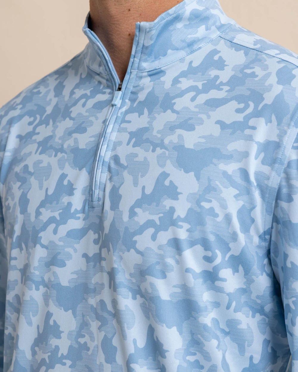 The detail view of the Southern Tide Island Camo Print Cruiser Quarter Zip by Southern Tide - Clearwater Blue