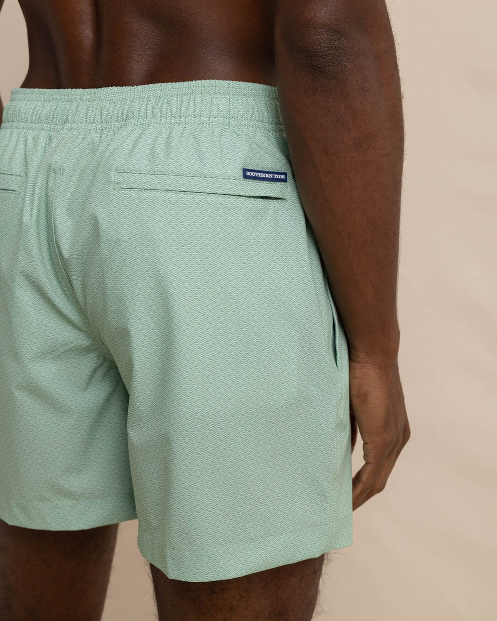 The detail view of the Southern Tide It's Wavey Baby Swim Trunk by Southern Tide - Basil Green