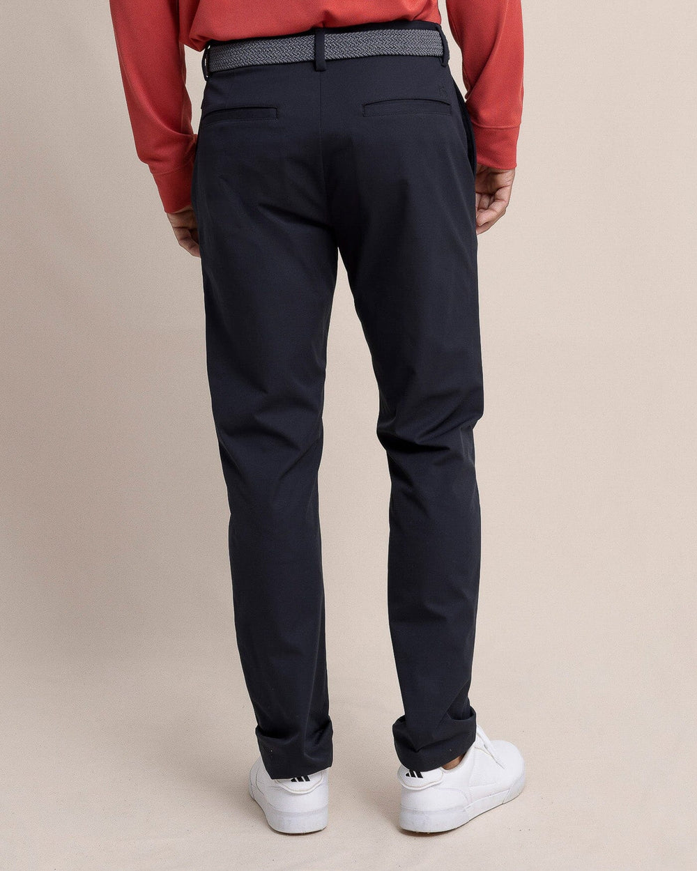 The back view of the Southern Tide Jack Performance Pant Caviar Black by Southern Tide - Caviar Black