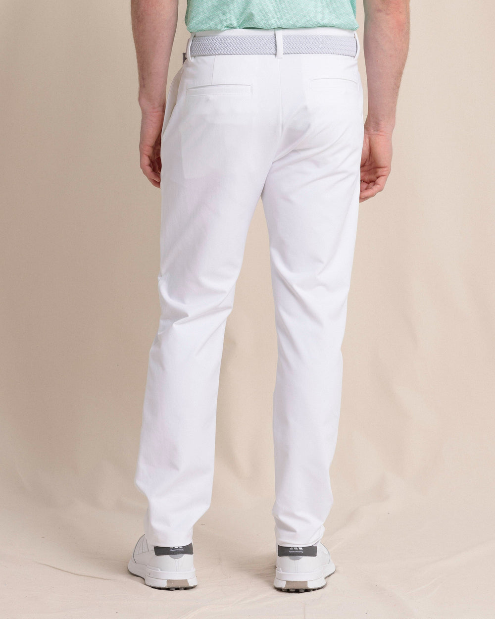 The back view of the Southern Tide Jack Performance Pant in Classic White by Southern Tide - Classic White