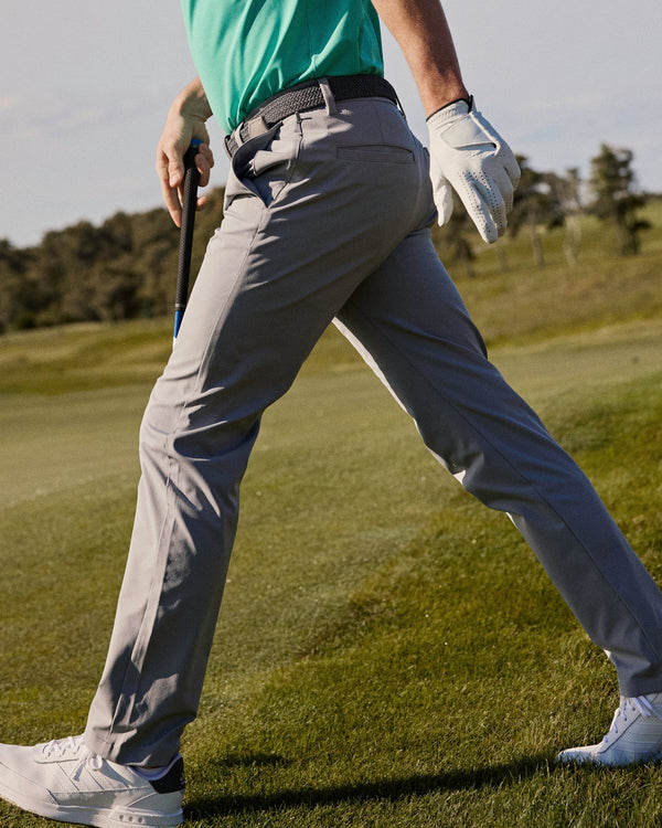 The lifestyle view of the Southern Tide Jack Performance Pant in Steel Grey by Southern Tide - Steel Grey