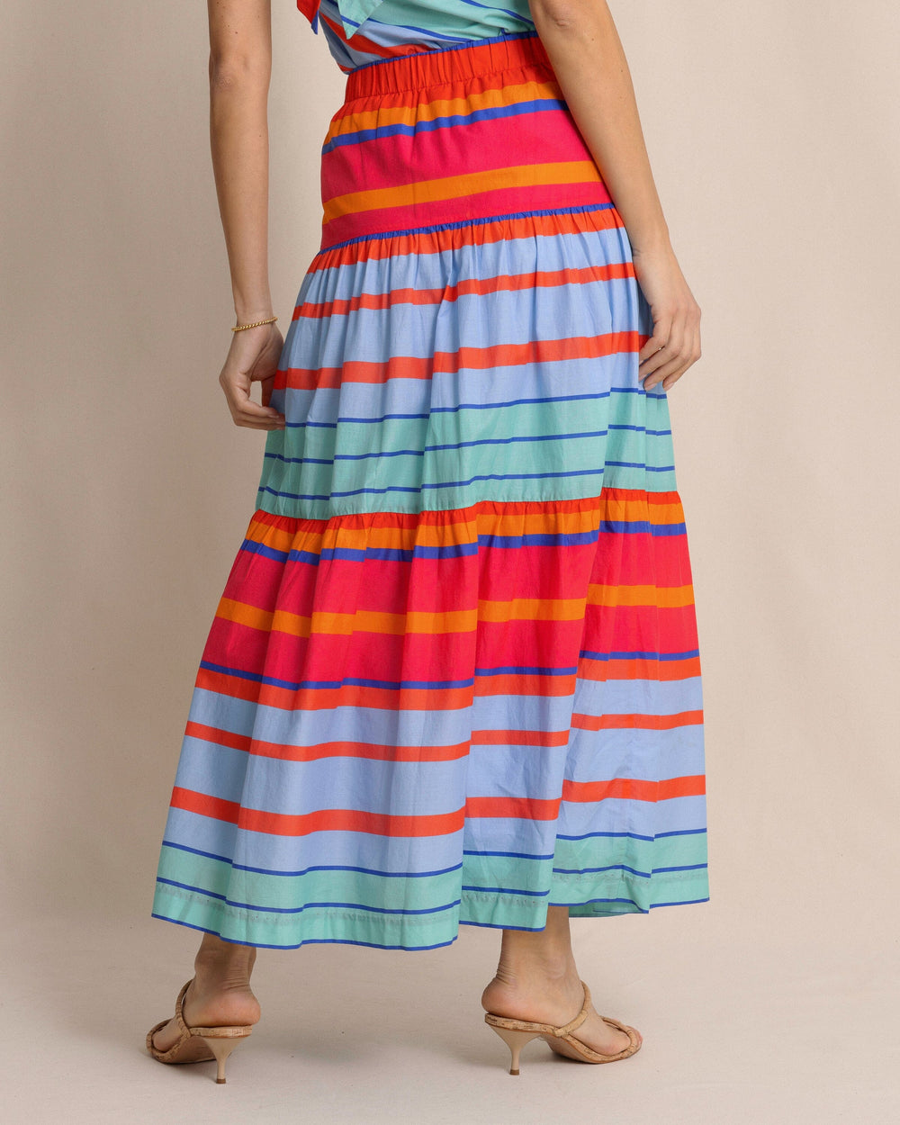 The back view of the Southern Tide Juliet Calypso Cay Stripe Maxi Skirt by Southern Tide - Calypso Berry