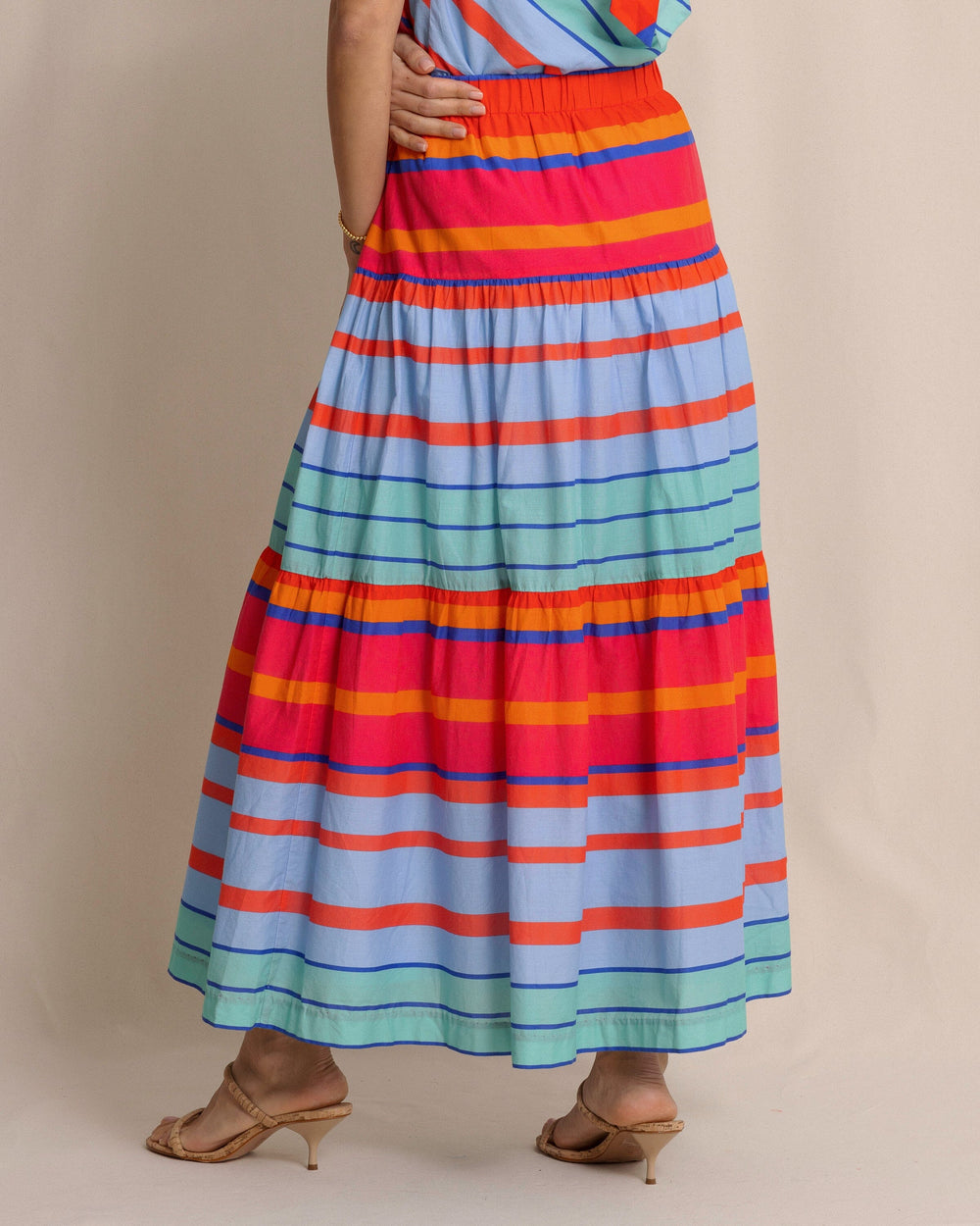 The back side view of the Southern Tide Juliet Calypso Cay Stripe Maxi Skirt by Southern Tide - Calypso Berry