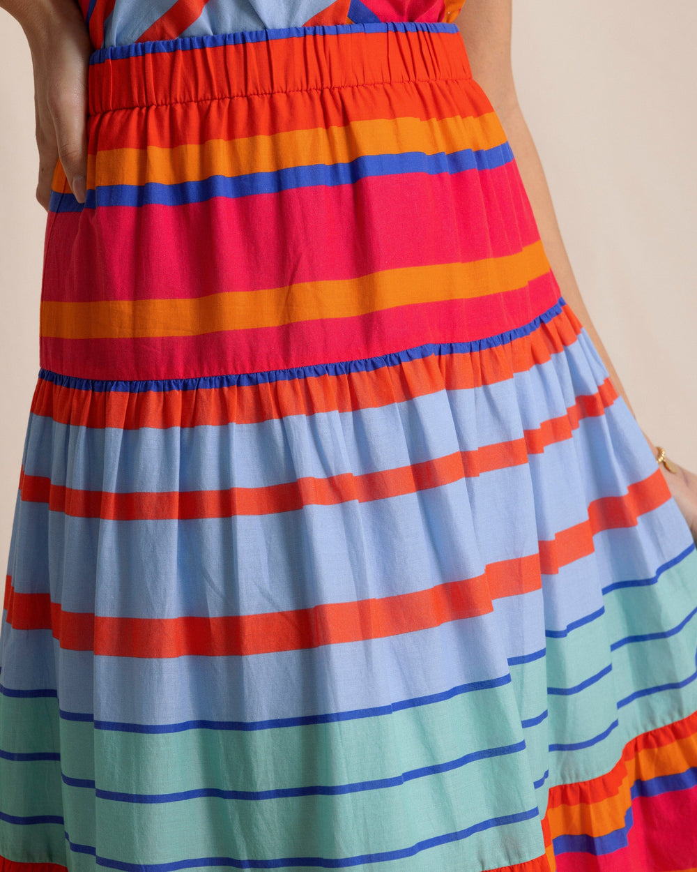 The front detail view of the Southern Tide Juliet Calypso Cay Stripe Maxi Skirt by Southern Tide - Calypso Berry