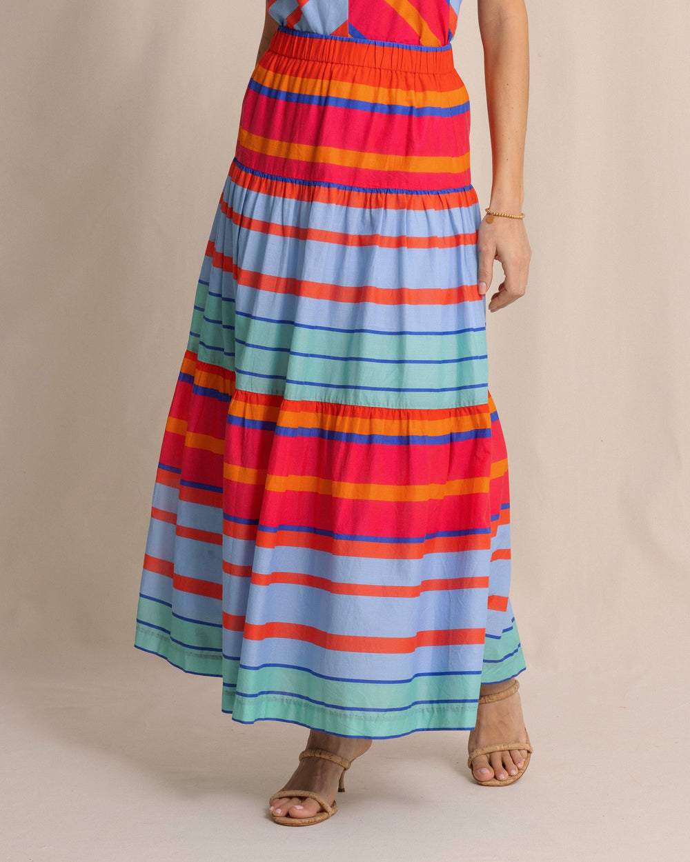 The front side view of the Southern Tide Juliet Calypso Cay Stripe Maxi Skirt by Southern Tide - Calypso Berry