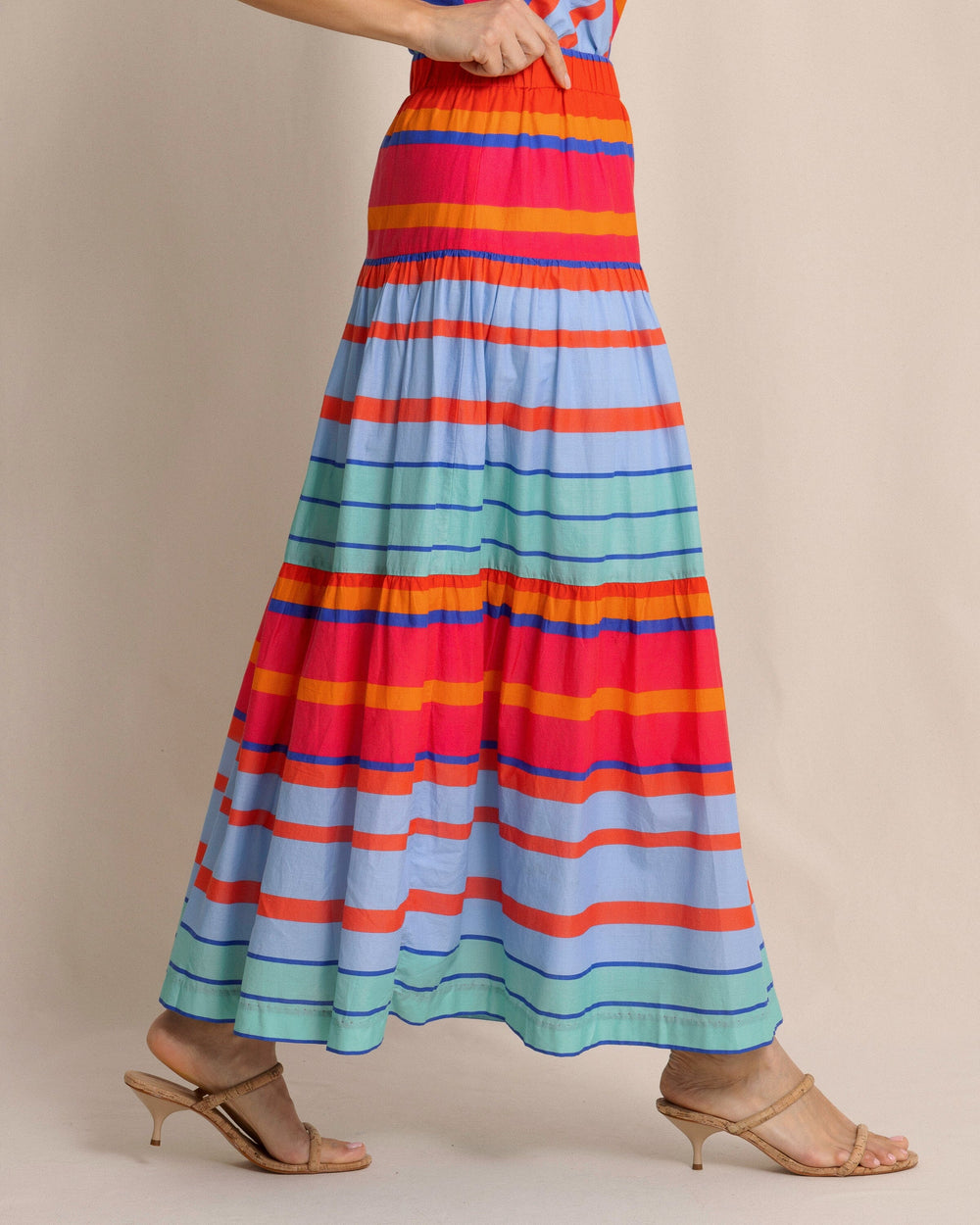 The side view of the Southern Tide Juliet Calypso Cay Stripe Maxi Skirt by Southern Tide - Calypso Berry