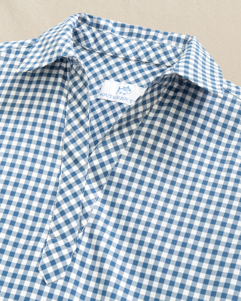 The detail view of the Southern Tide Kamryn Gingham Coastal Breeze® Dress by Southern Tide - Nautical Blue