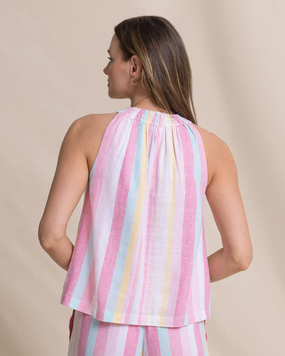 The back view of the Southern Tide Karlea Smocked Neck Blouse by Southern Tide - Island Pink