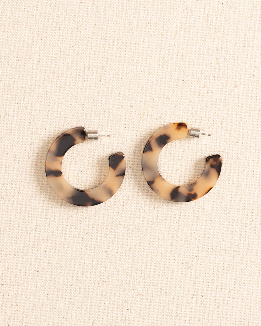 The front view of the Machete Kate Hoop Earrings by Southern Tide - Blonde Tortoise