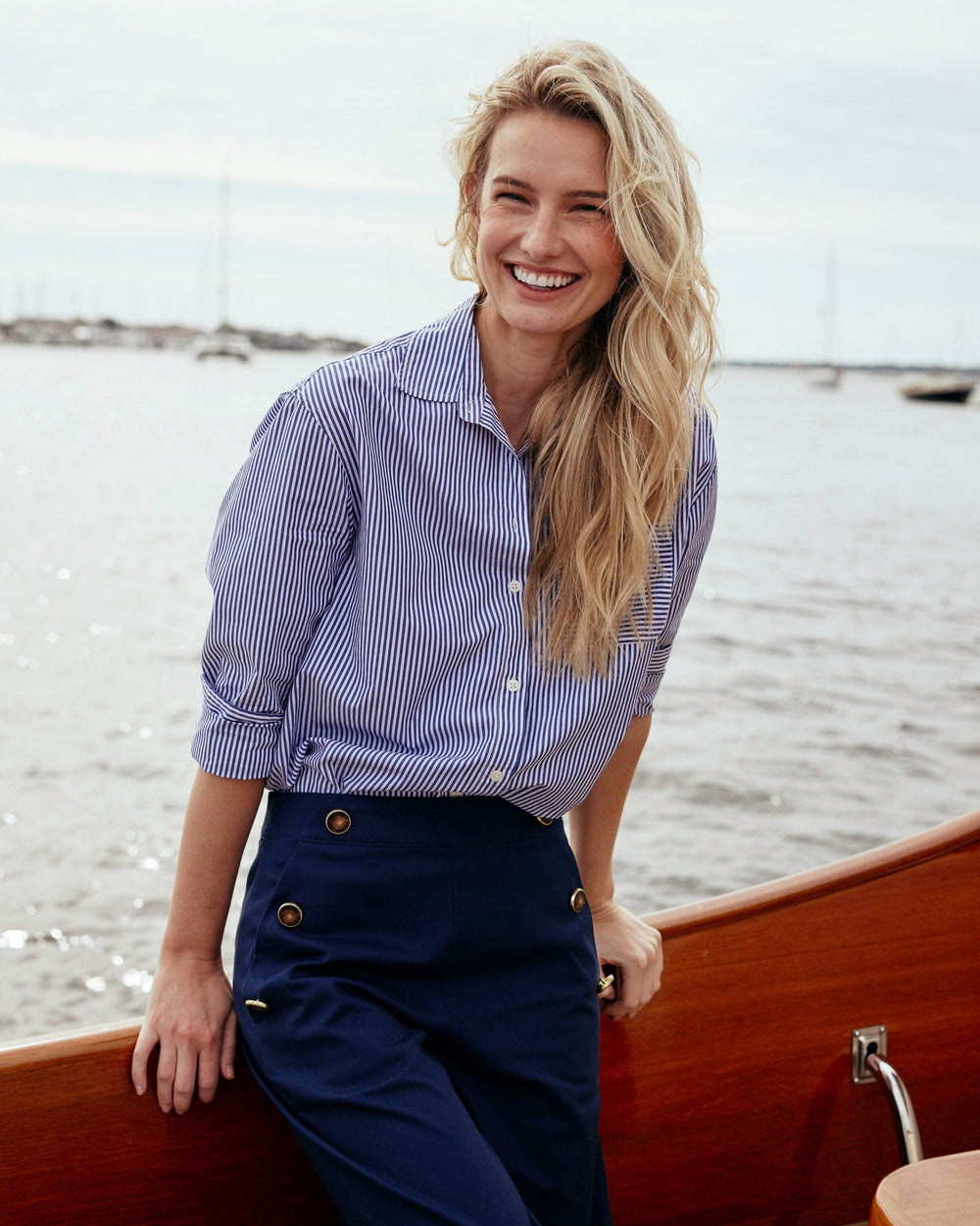 The lifestyle view of the Southern Tide Katherine Stripe Shirt by Southern Tide - Dress Blue