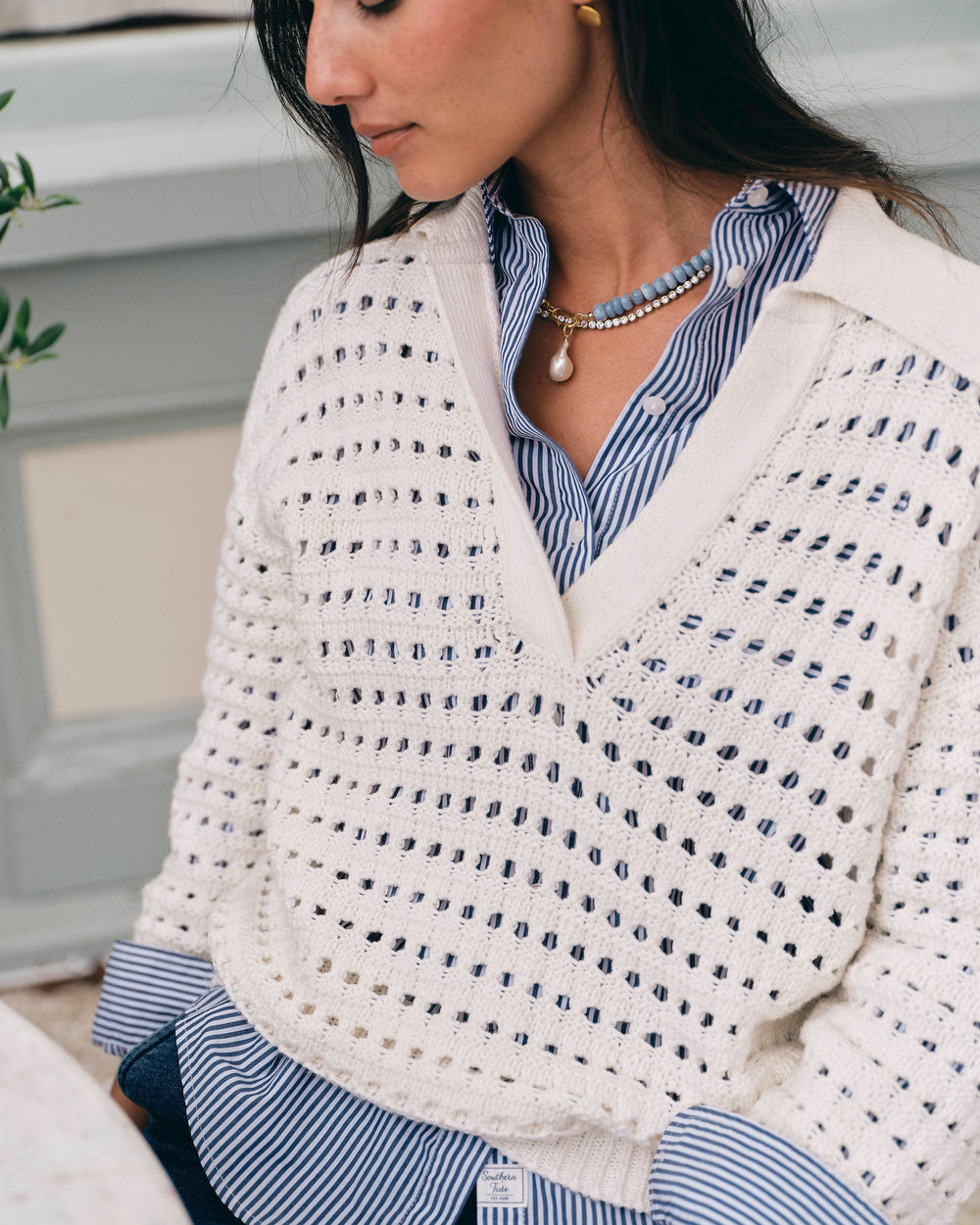 The lifestyle view of the Southern Tide Kay Sailor Collar Sweater by Southern Tide - Star White