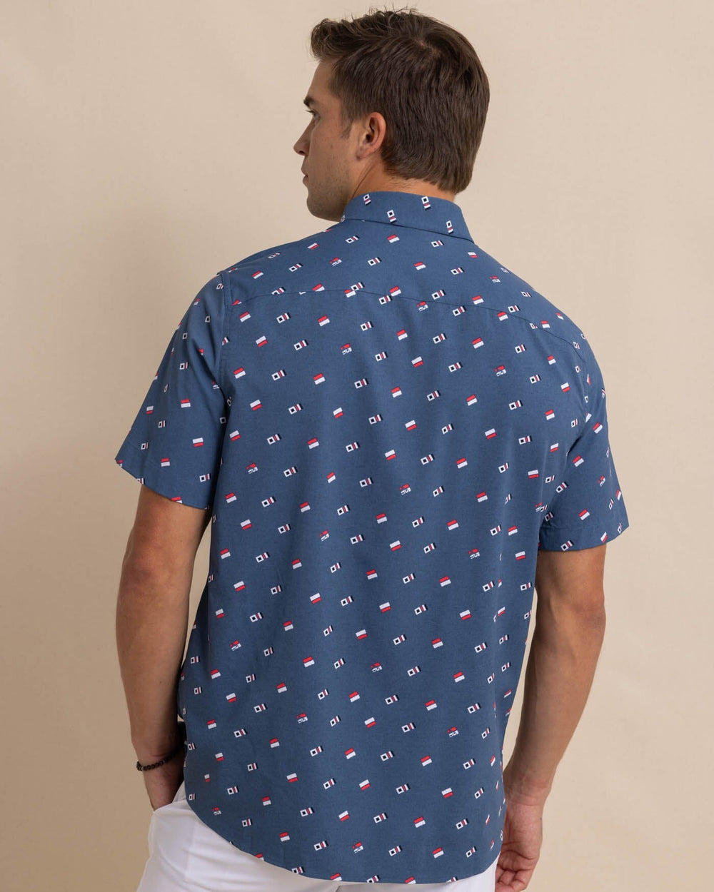 The back view of the Southern Tide Keep It Nautical Intercoastal Heather Short Sleeve Sportshirt by Southern Tide - Heather Aged Denim