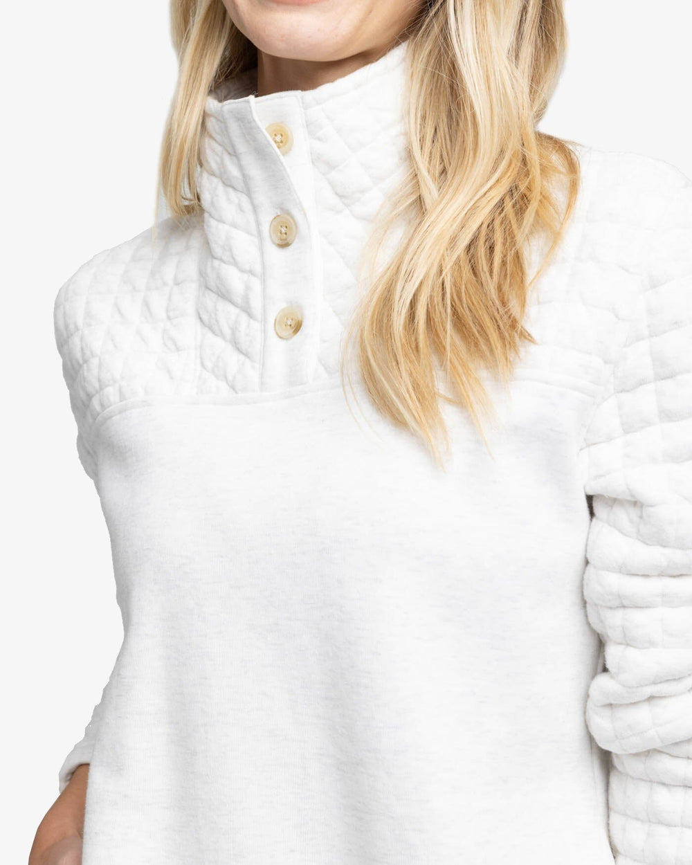 The detail view of the Southern Tide Kelsea Quilted Heather Pullover by Southern Tide - Heather Star White