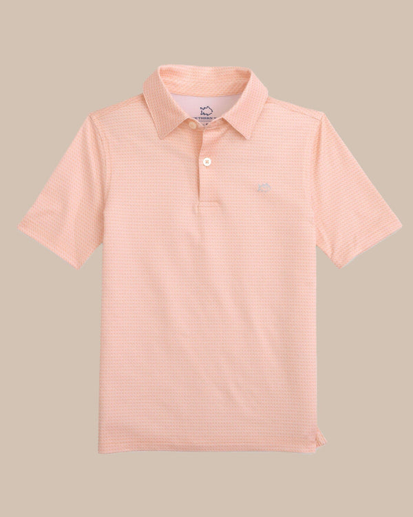 The front view of the Southern Tide Kids Driver Getting Ziggy With It Printed Polo by Southern Tide - Apricot Blush Coral