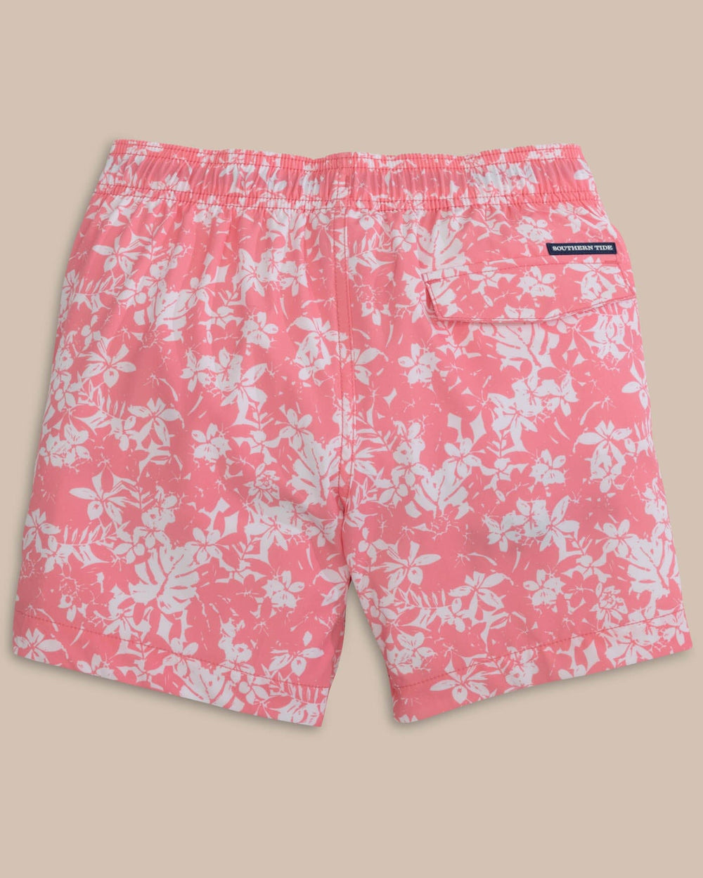 The back view of the Southern Tide Kids Island Blooms Swim Trunk by Southern Tide - Geranium Pink