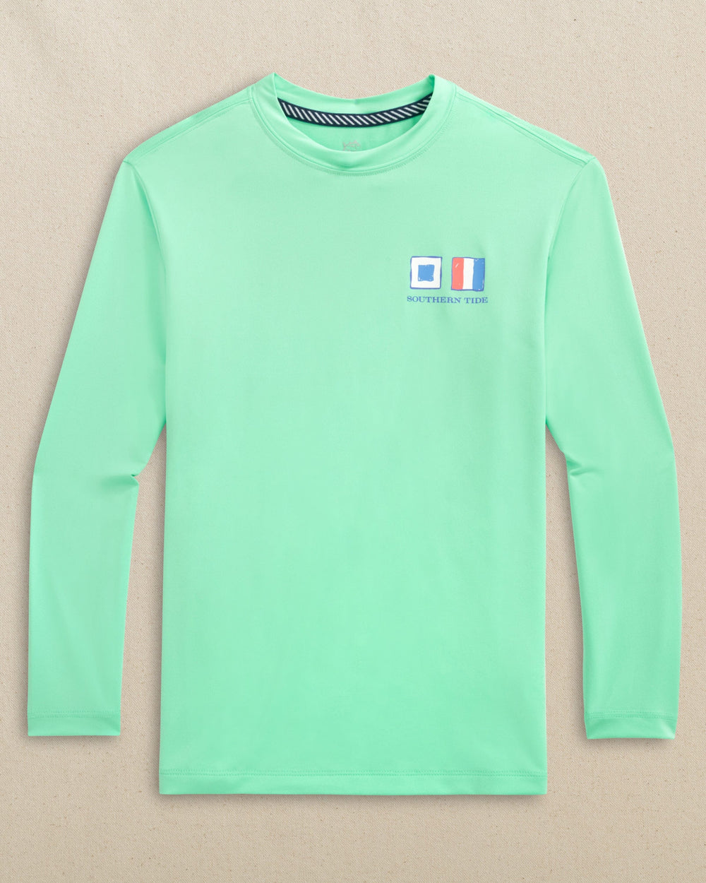 The front view of the Southern Tide Kids Nautical Flags Long Sleeve Performance T-Shirt by Southern Tide - Gulf Shores