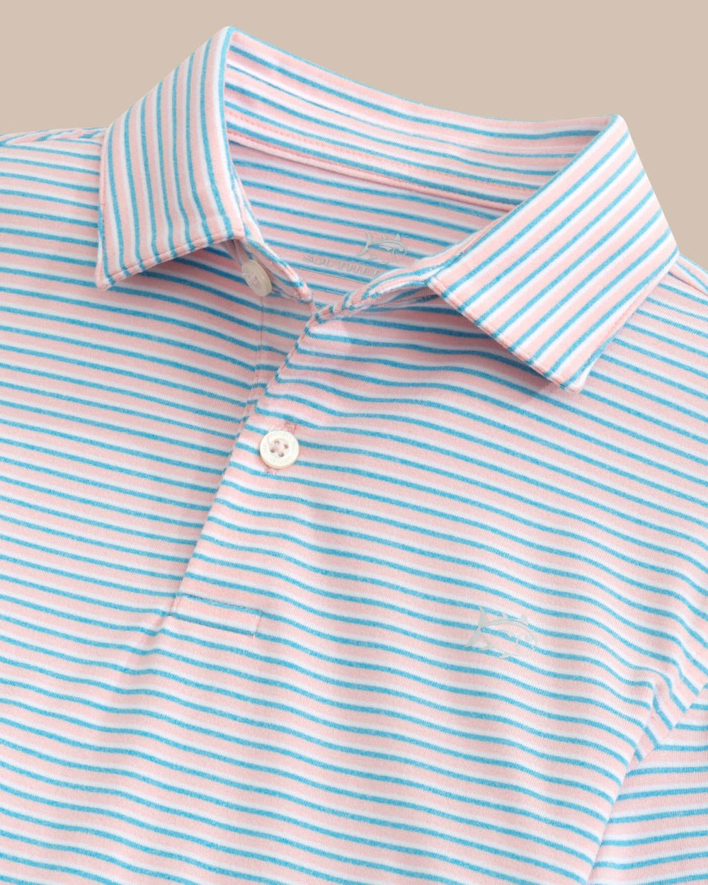The detail view of the Southern Tide Kids Ryder Heather Halls Stripe Performance Polo by Southern Tide - Heather Pale Rosette Pink