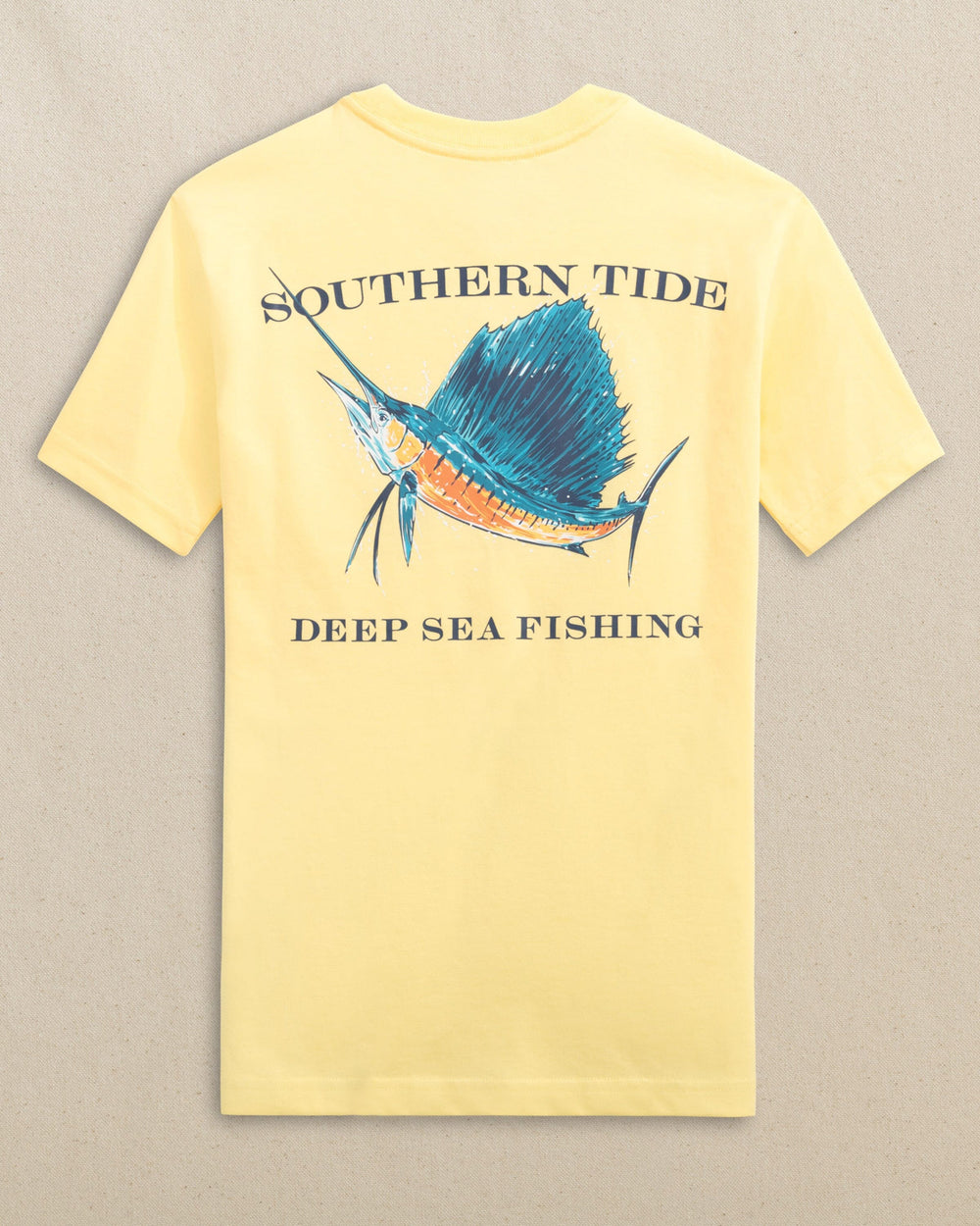 The back view of the Southern Tide Kids Sailfish Deep Sea Fishing Short Sleeve T-Shirt by Southern Tide - Pineapple