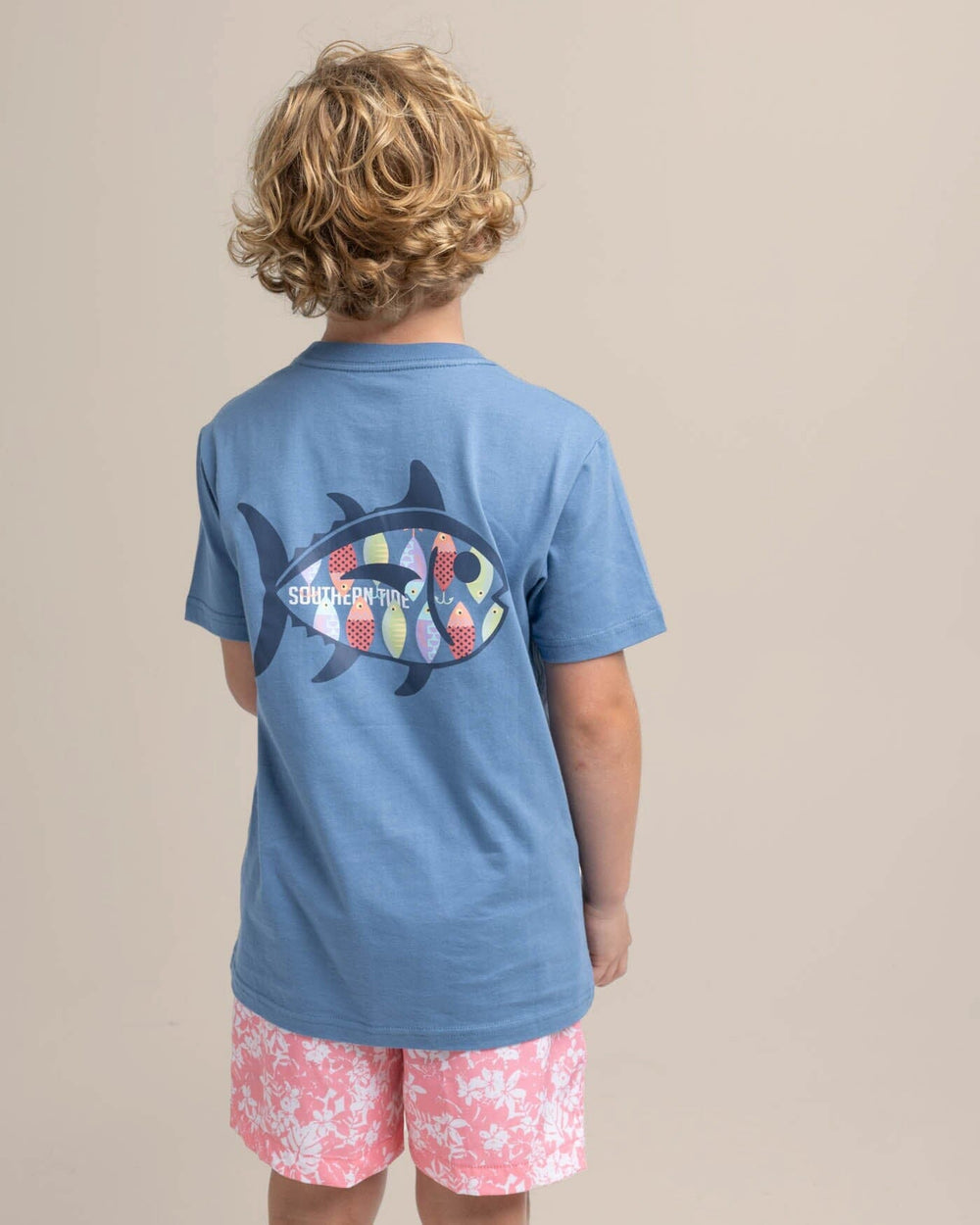 The back view of the Southern Tide Youth Skipjack Lure Fill Short Sleeve T-shirt by Southern Tide - Coronet Blue