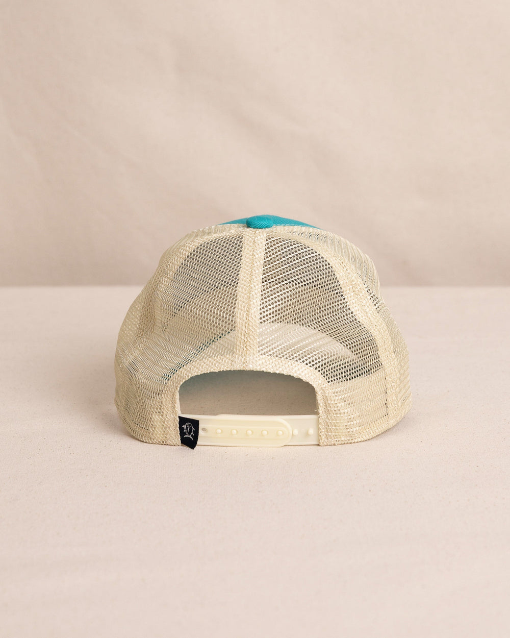 The back view of the Southern Tide Kids ST Leather Patch Trucker Hat by Southern Tide - Spruce Shade