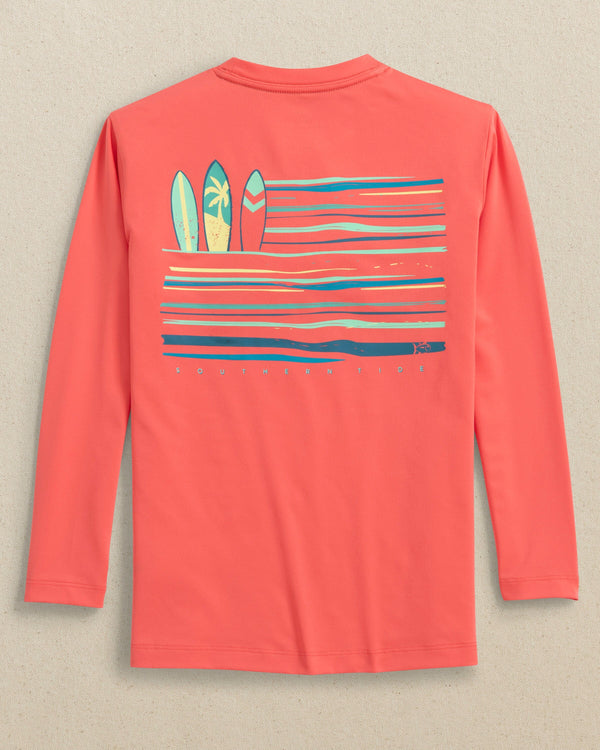 The back view of the Southern Tide Kids Surfing Stripes Long Sleeve Performance T-Shirt by Southern Tide - Sunset Coral