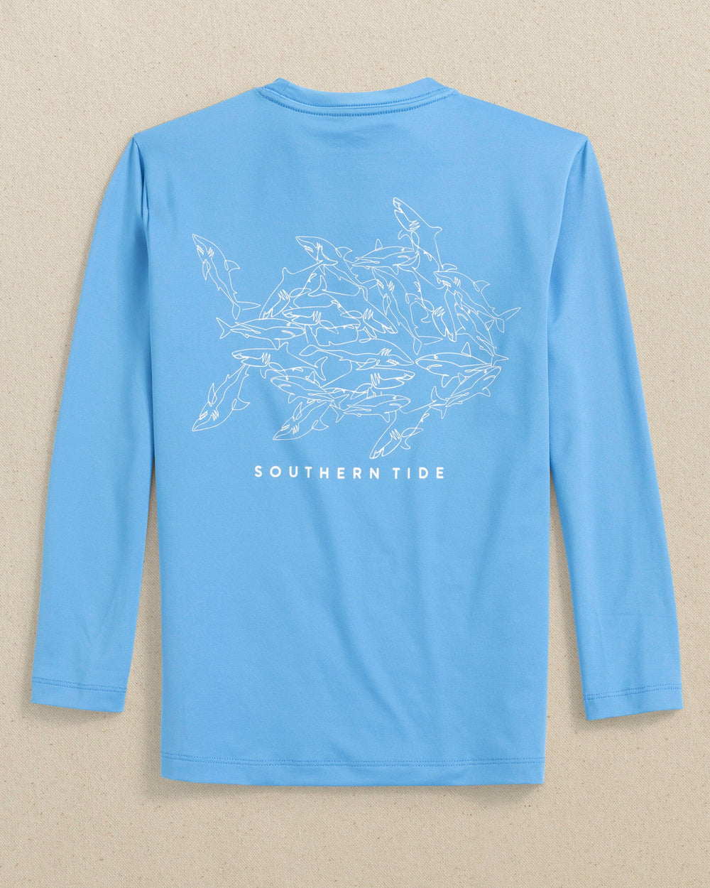 The back view of the Southern Tide Kids Uh Oh Sharks Long Sleeve Performance T-Shirt by Southern Tide - Boat Blue