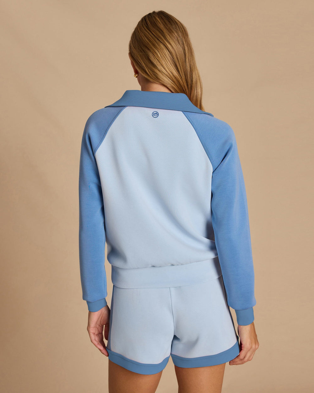 The back view of the Southern Tide Kira Colorblock Quarter Zip Pullover by Southern Tide - Windsurfer