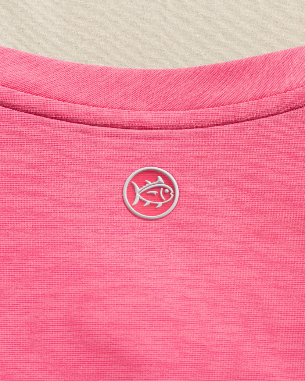 The detail view of the Southern Tide Lacy Coastal Breeze® Active Twist Tank by Southern Tide - Island Pink
