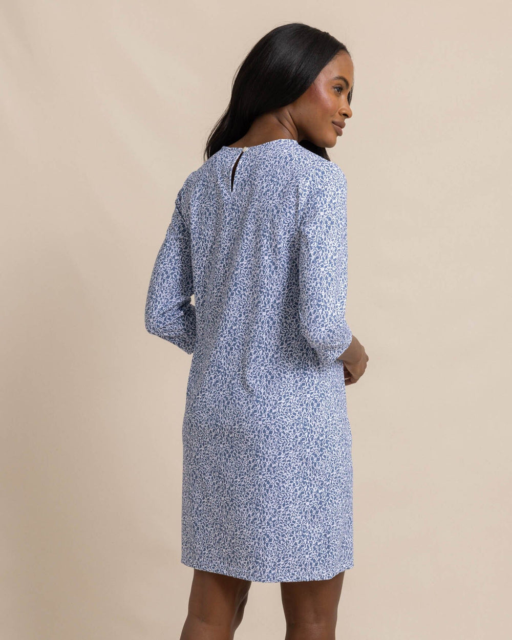 The angle view of the Southern Tide Leira That Floral Feeling Print Performance Dress by Southern Tide - Coronet Blue