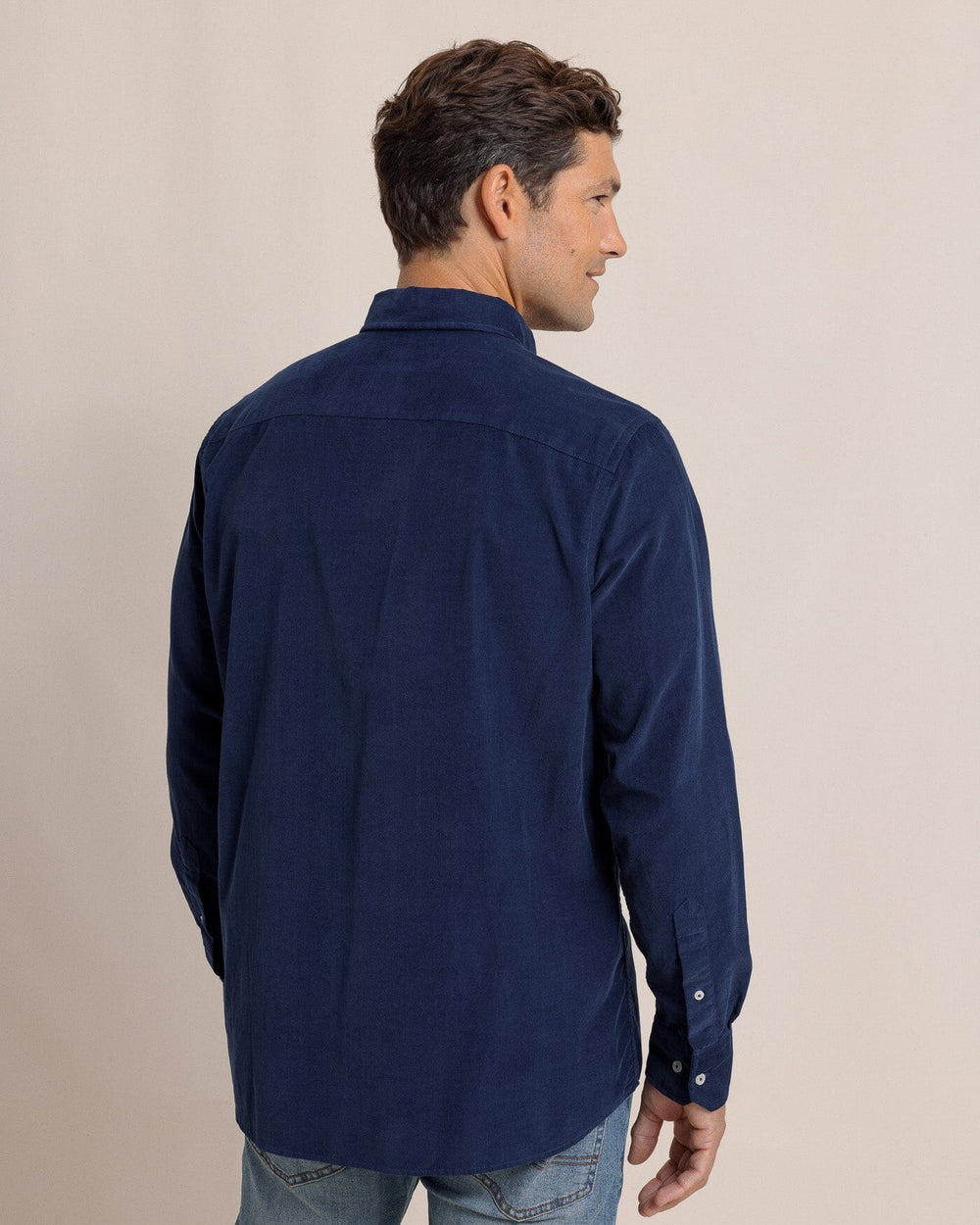 The back view of the Southern Tide Lightweight Bedford Cord Long Sleeve Sport Shirt by Southern Tide - Dress Blue