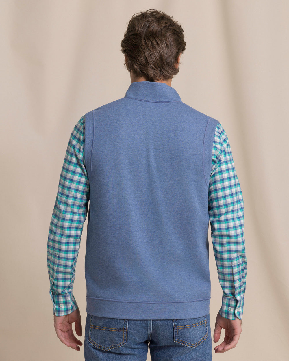The back view of the Southern Tide Lightweight Knit Heather Reversible Vest by Southern Tide - Heather Anchor Grey