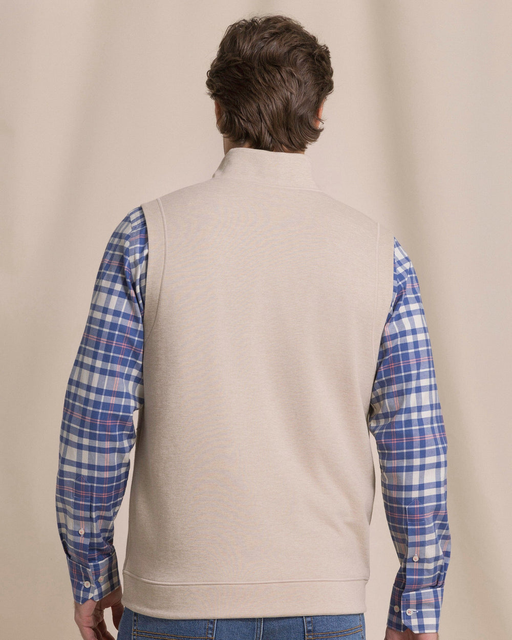 The back view of the Southern Tide Lightweight Knit Heather Reversible Vest by Southern Tide - Heather Sandstone Khaki