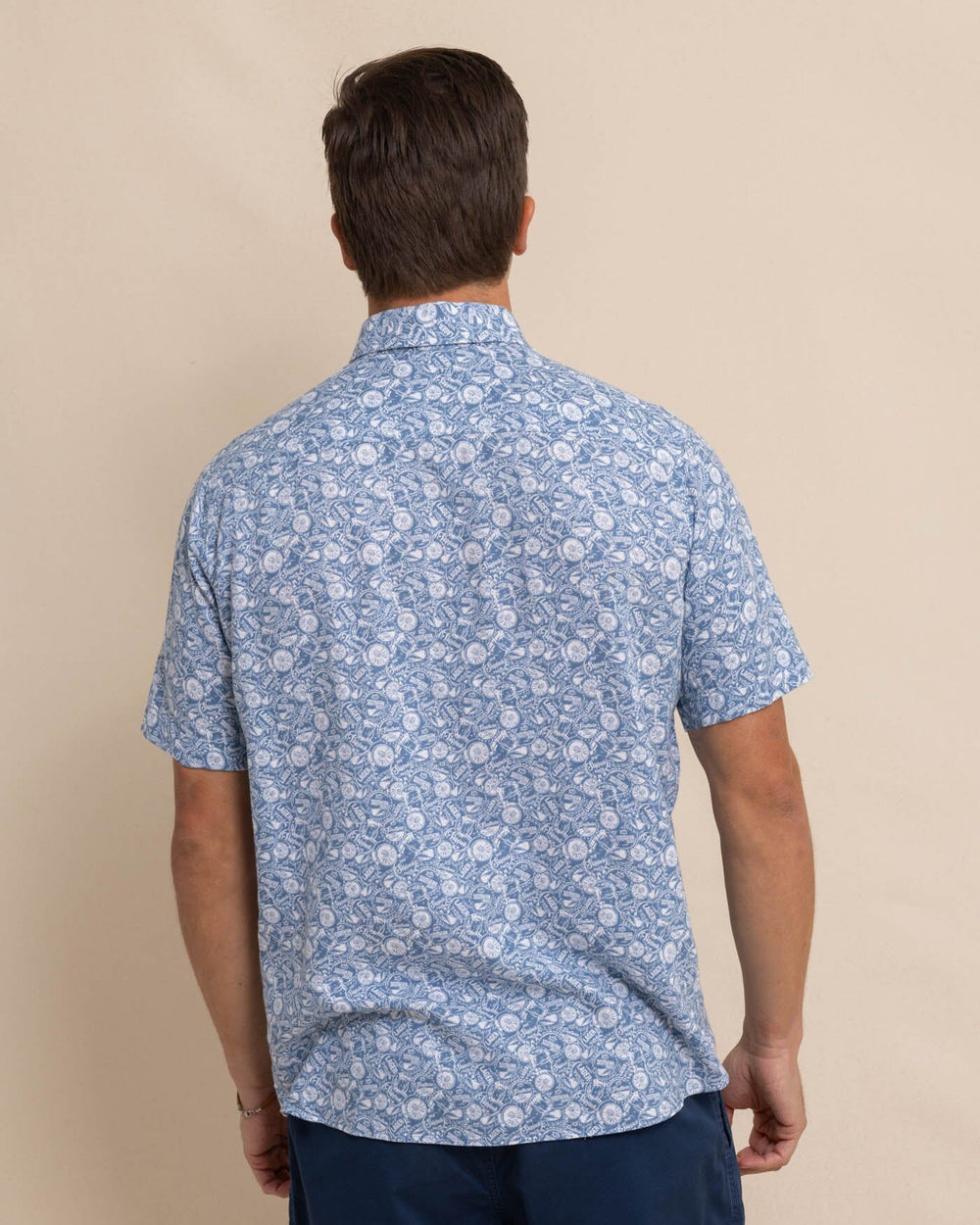 The back view of the Southern Tide Linen Rayon Caps Off Short Sleeve Sport Shirt by Southern Tide - Coronet Blue