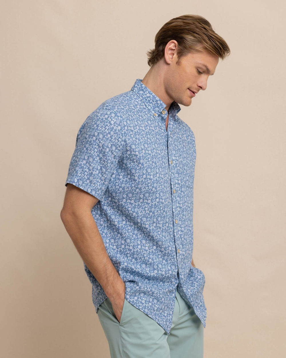 The front view of the Southern Tide Linen Rayon Ditzy Floral Short Sleeve Sport Shirt by Southern Tide - Coronet Blue